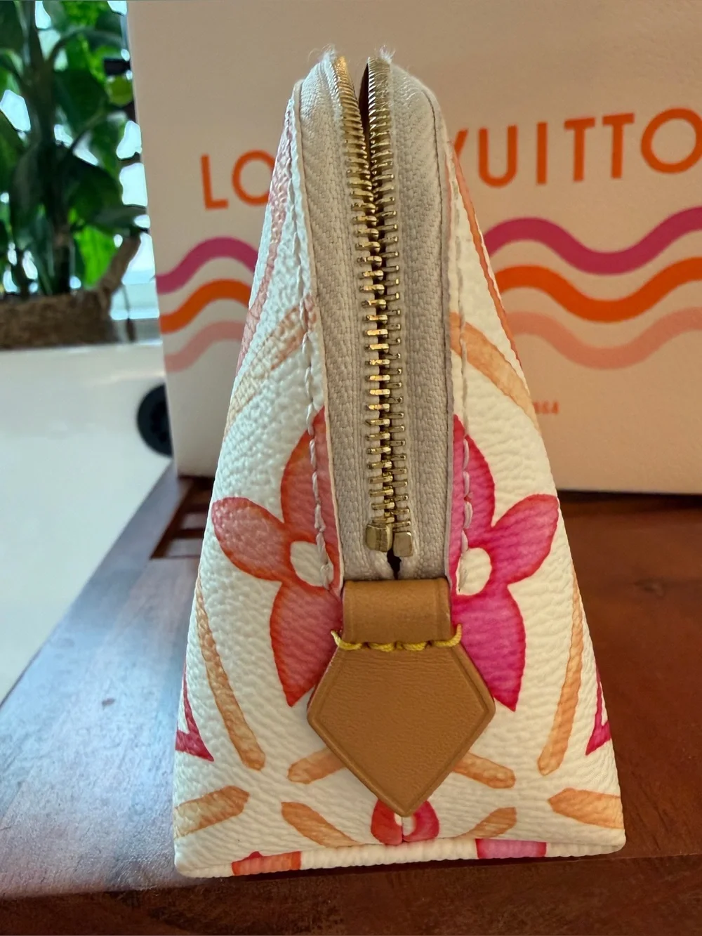 Louis Vuitton Cream Cosmetic Pouch with Pink & Orange Monogram.